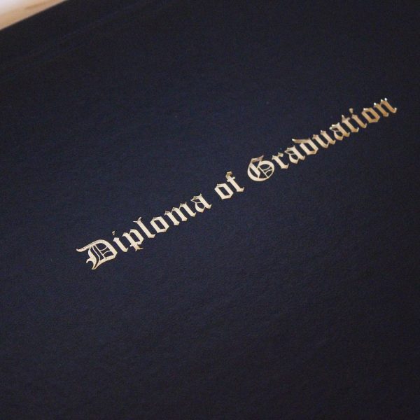 Closeup of foil stamping on diploma cover