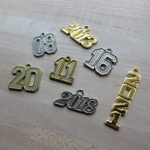 backdated tassel charms
