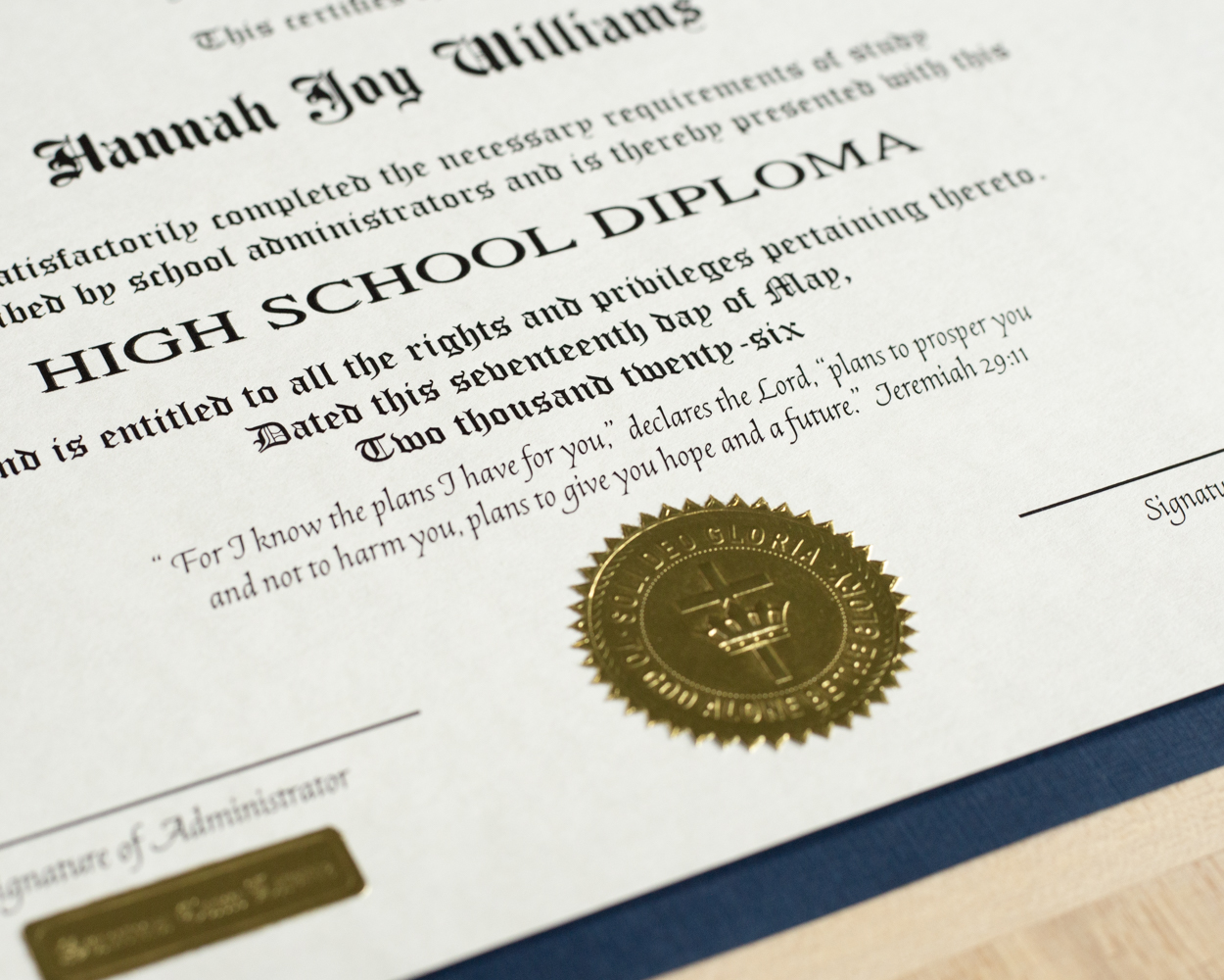 diploma with bible verse and gold seal